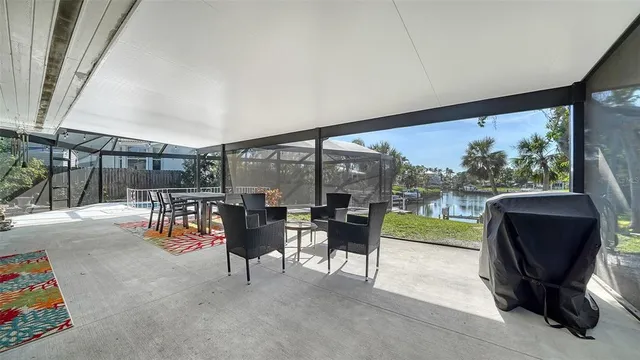 a backyard of a house with seating space