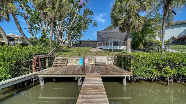 a view of a chairs and table in the terrace