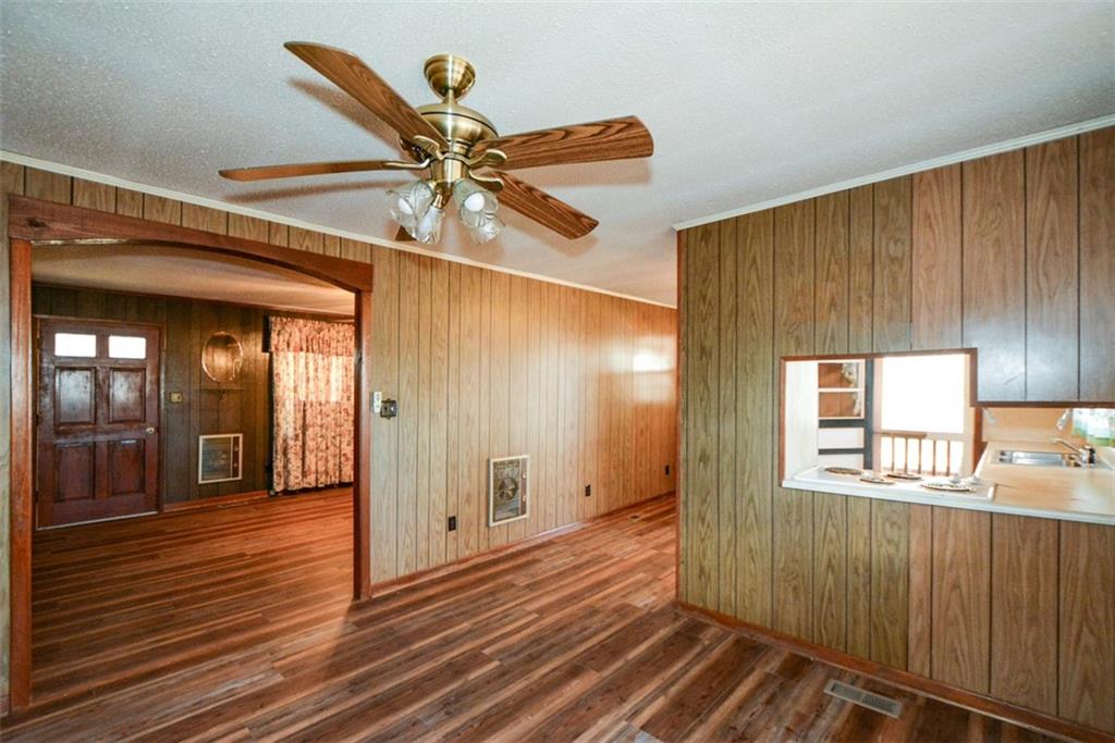 6267 Mt Pisgah Road Ellijay, GA 30540 - Photo 14 of 55 a view of a hallway with wooden floor and a bathroom