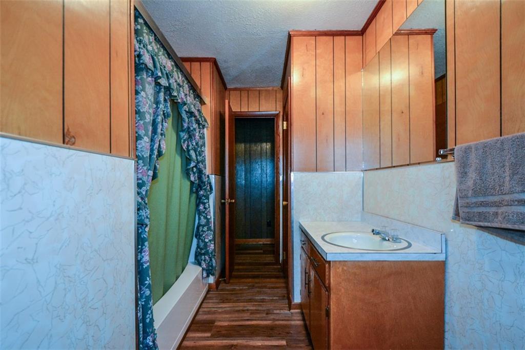 6267 Mt Pisgah Road Ellijay, GA 30540 - Photo 27 of 55 a utility room with closet and wooden floor