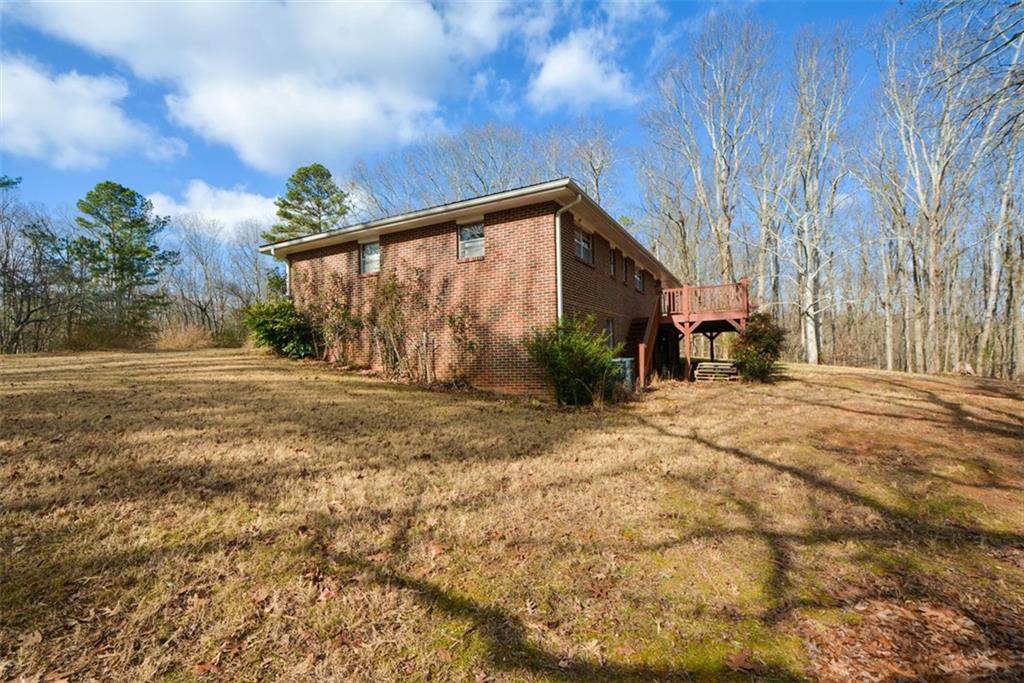 6267 Mt Pisgah Road Ellijay, GA 30540 - Photo 47 of 55 a backyard of a house with lots of green space