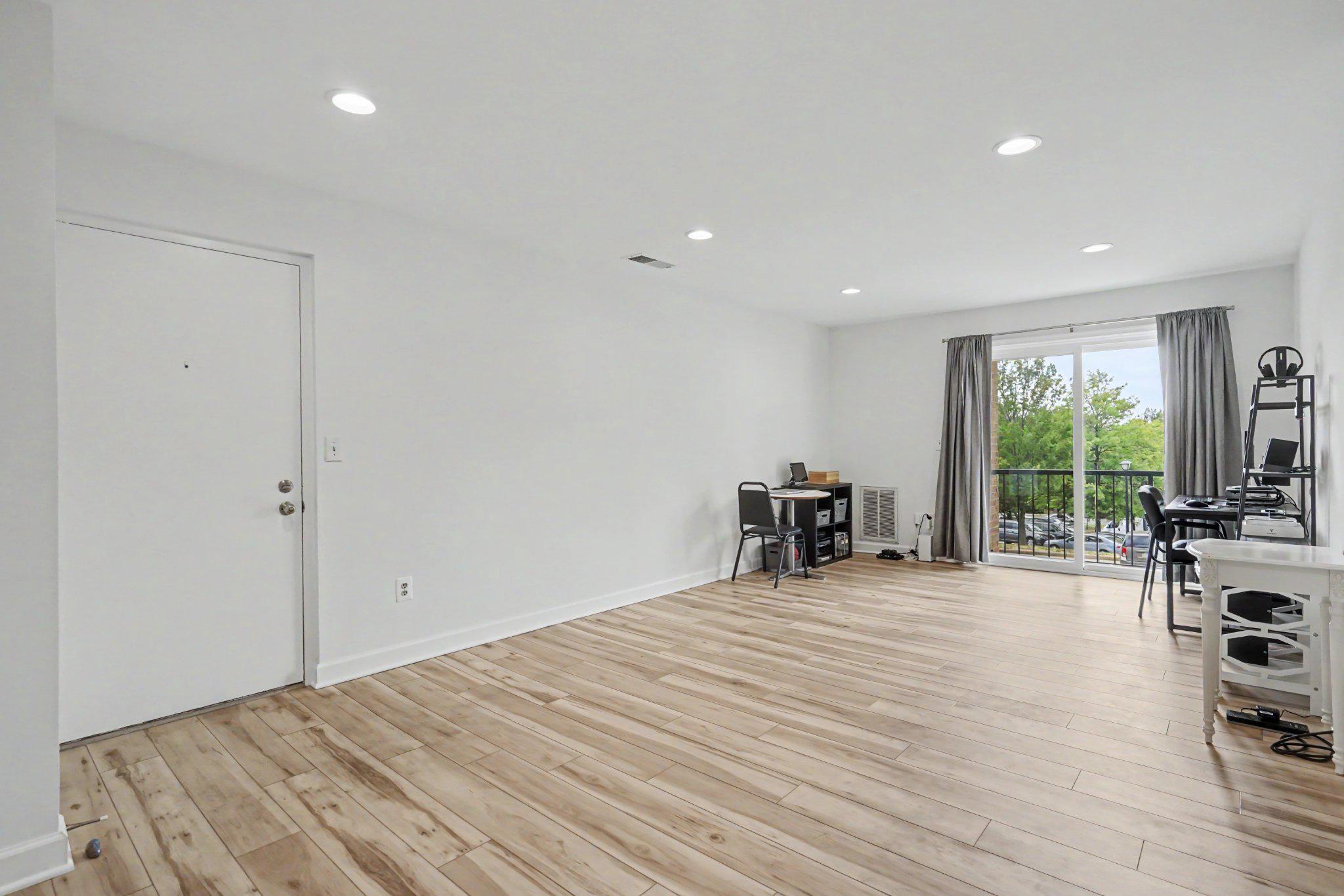14800 Rydell Road, Unit 201 Centreville, VA 20121 - Photo 5 of 28 Rooms really show off the specialty flooring.