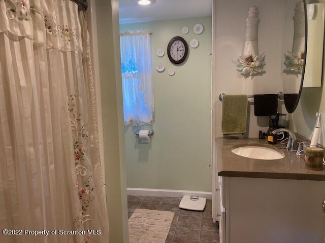 525 State Rte 2010 Union Dale, PA 18470 - Photo 29 of 31 a bathroom with a sink a toilet and shower