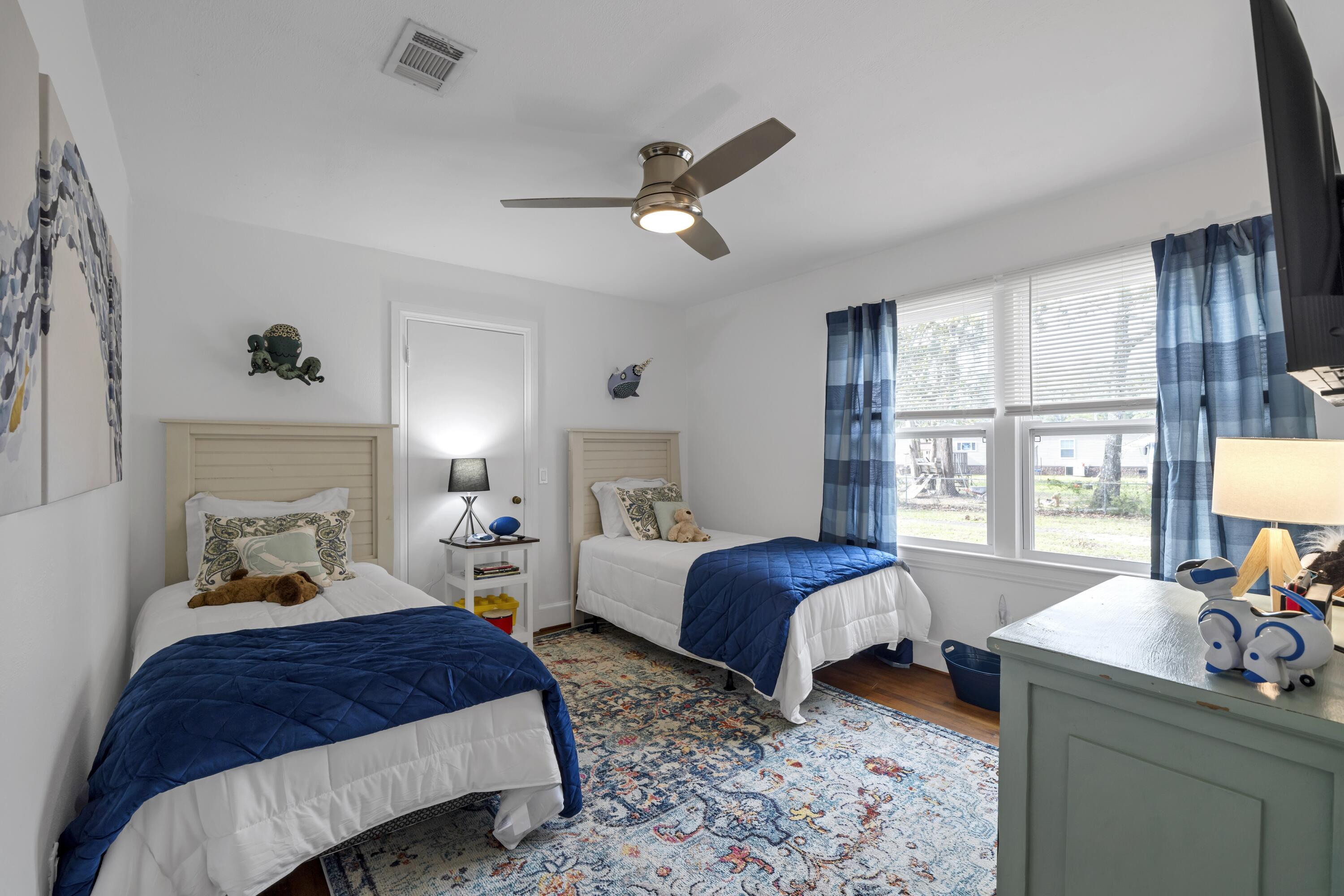 13382 Highway 20 Freeport, FL 32439 - Photo 16 of 43 a bedroom with bed and a window