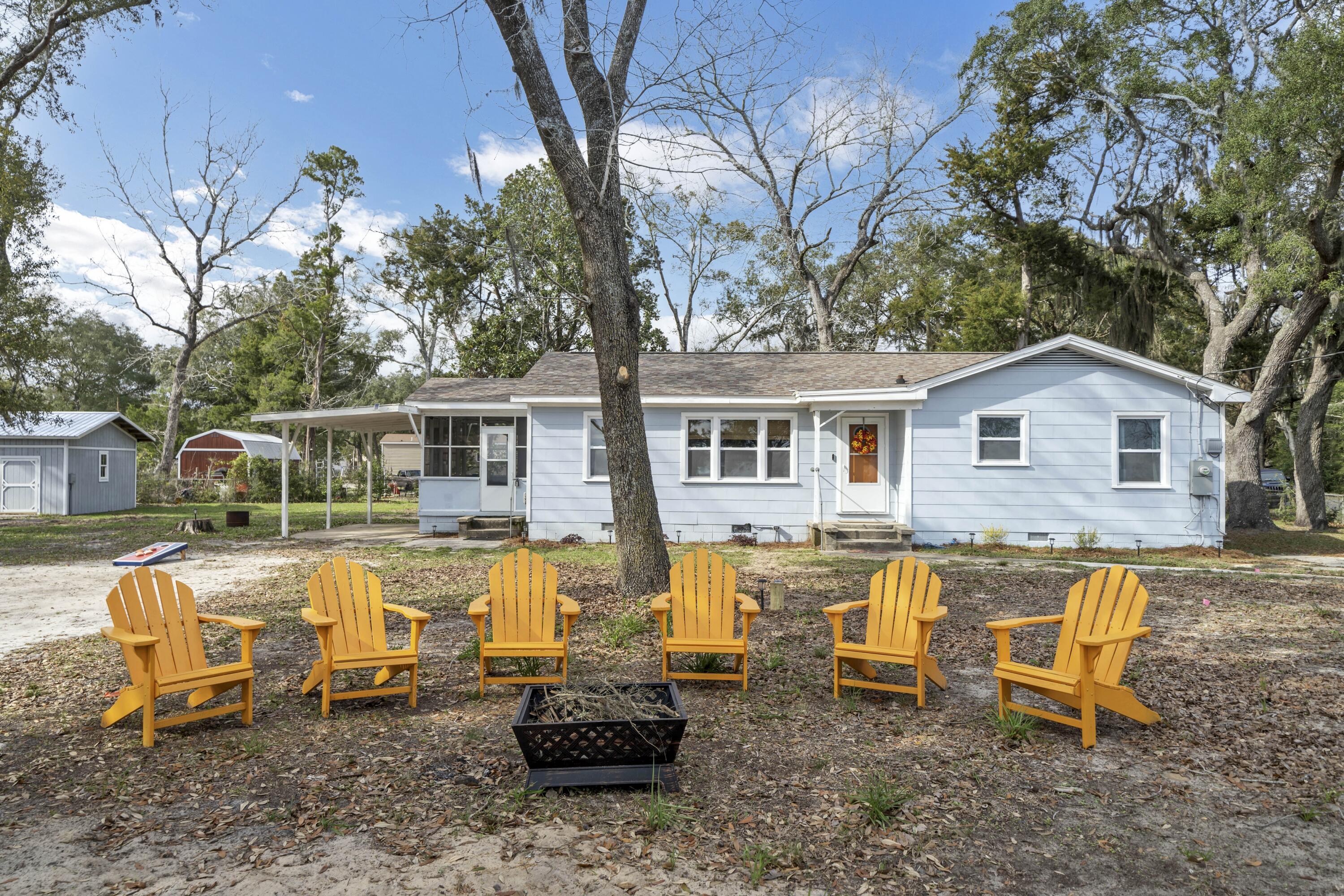 13382 Highway 20 Freeport, FL 32439 - Photo 2 of 43 a view of a house with swimming pool and sitting area