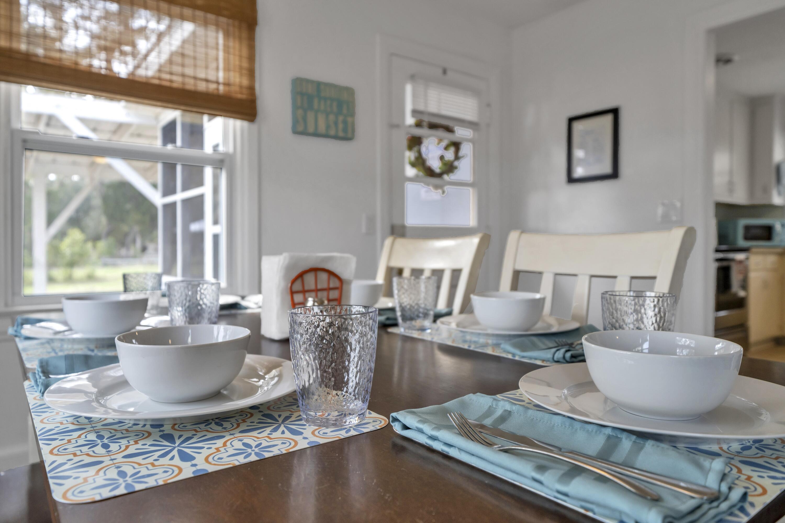 13382 Highway 20 Freeport, FL 32439 - Photo 25 of 43 a kitchen with a stove a sink and a dining table with garden view