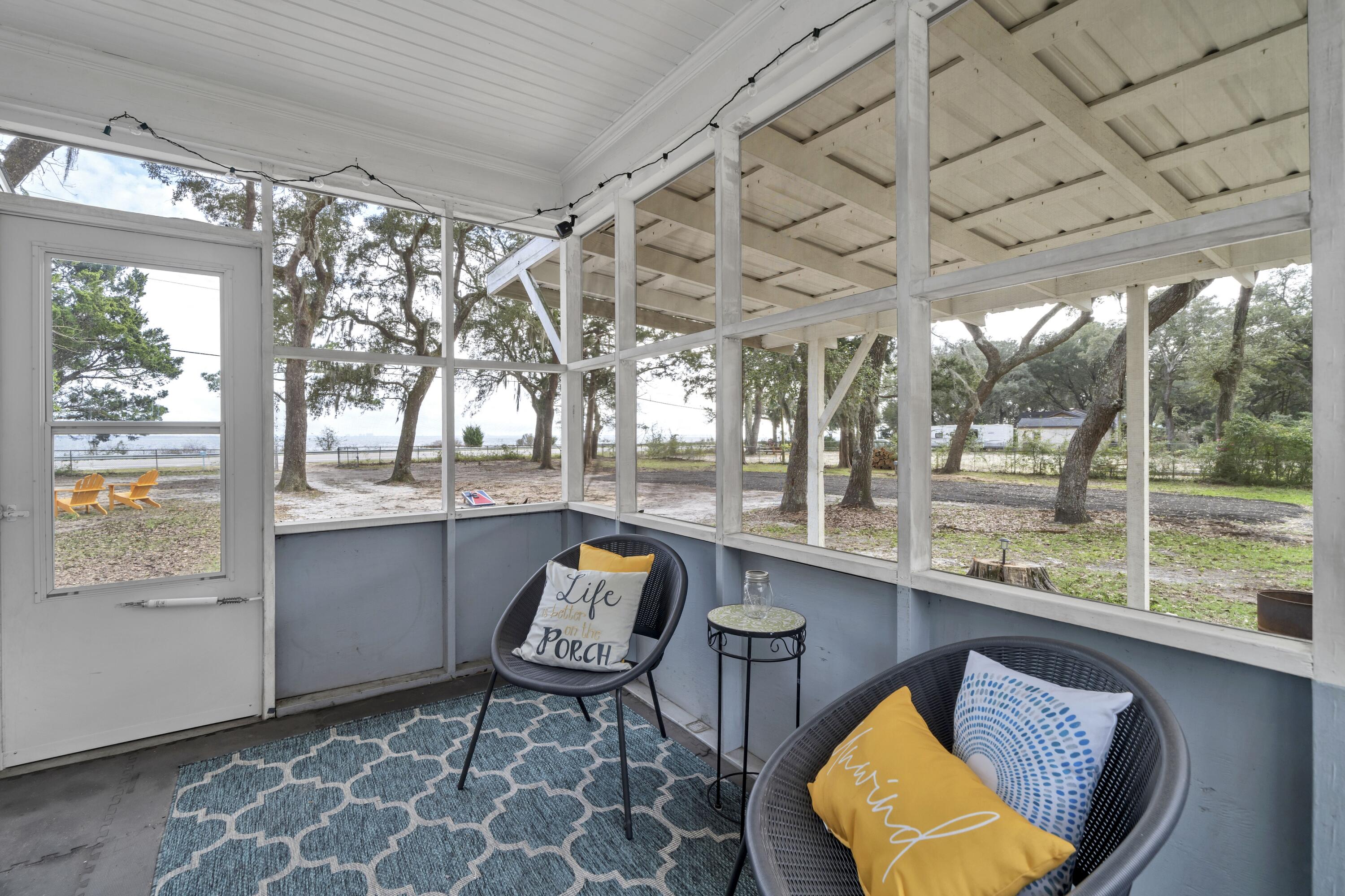 13382 Highway 20 Freeport, FL 32439 - Photo 35 of 43 a outdoor space with lots of furniture and windows