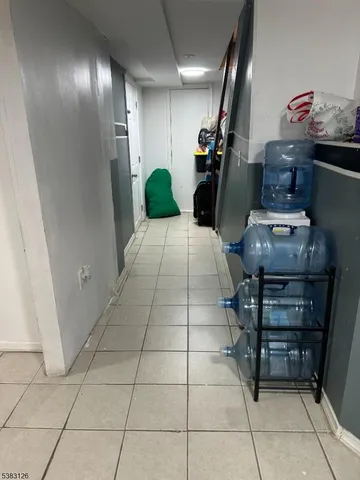 a kitchen with stainless steel appliances granite countertop a refrigerator and a stove