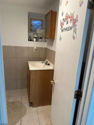 a bathroom with a toilet and shower