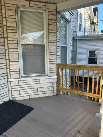 a view of a house with a large window
