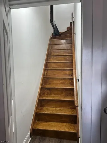 a kitchen with a sink a window and a counter top space