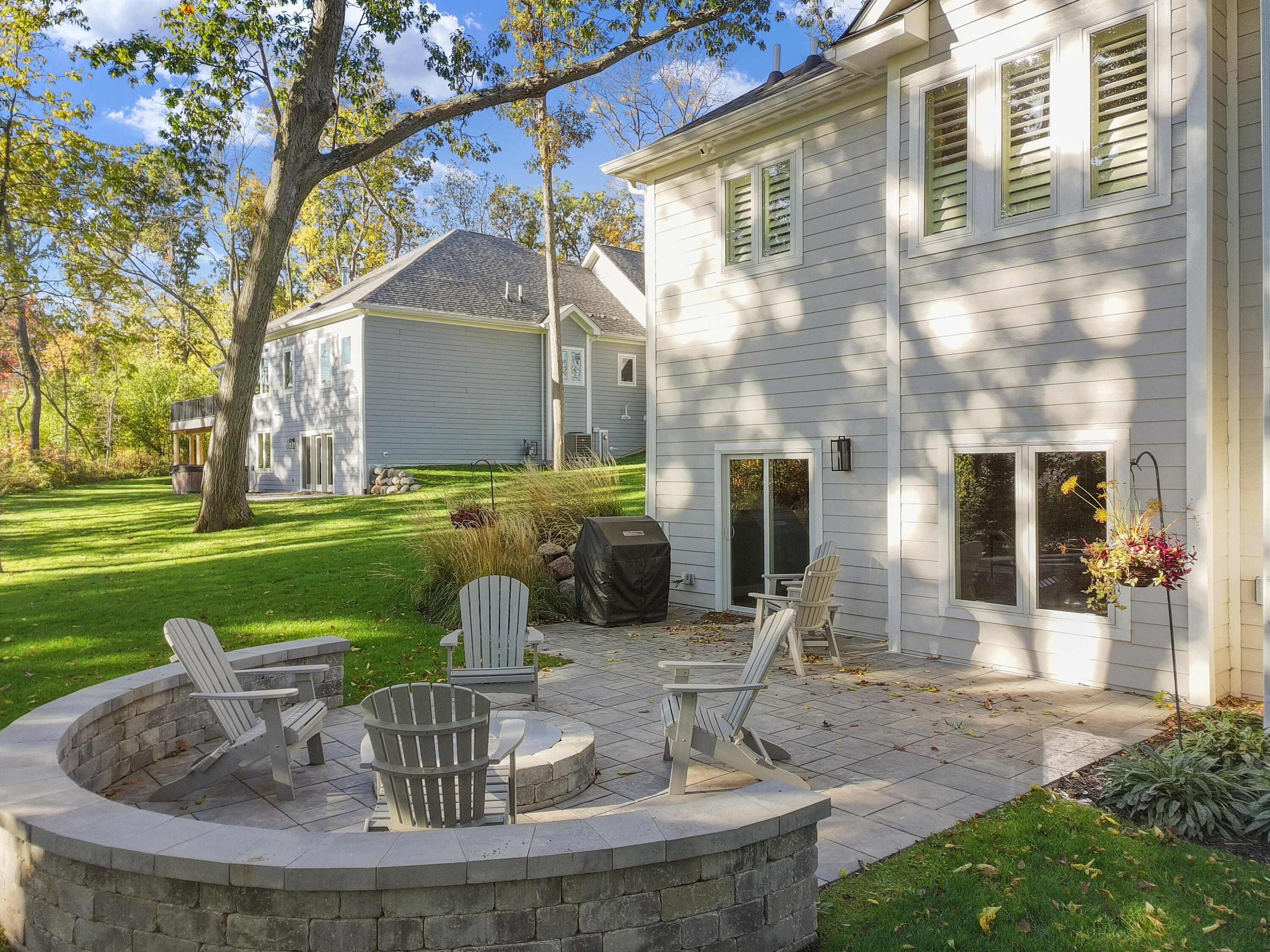 1581 Ryder Cup Road, Unit 1631 Geneva, WI 53147 - Photo 32 of 54 Stone Paver Patio with Gas Firepit