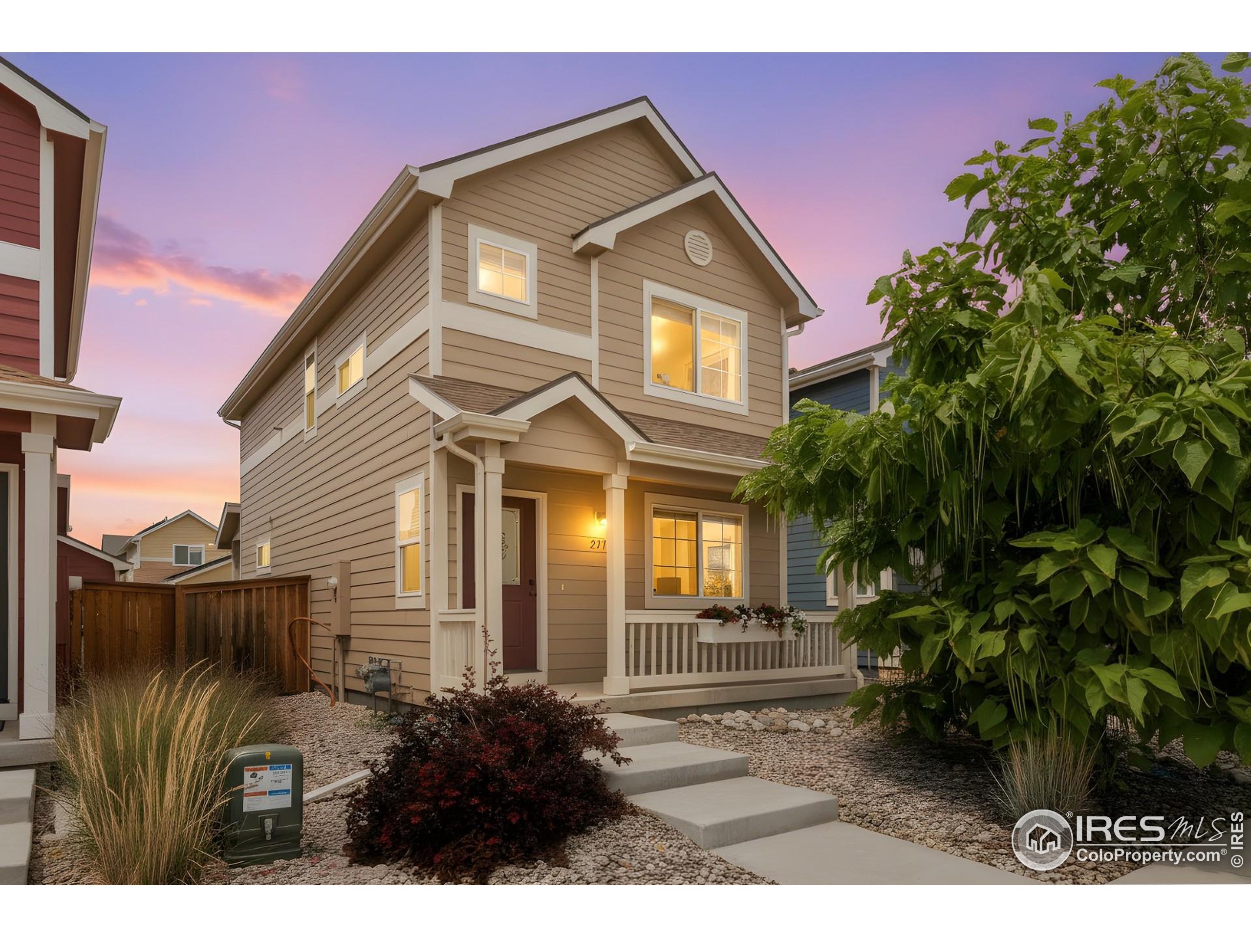 2771 Red Wheat Trail Berthoud, CO 80513 - Photo 1 of 46 a view of a house with a yard