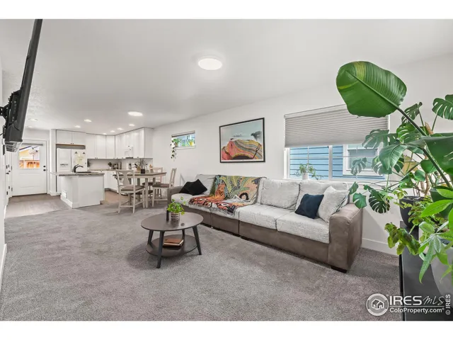 a bedroom with a large bed and a walk in closet