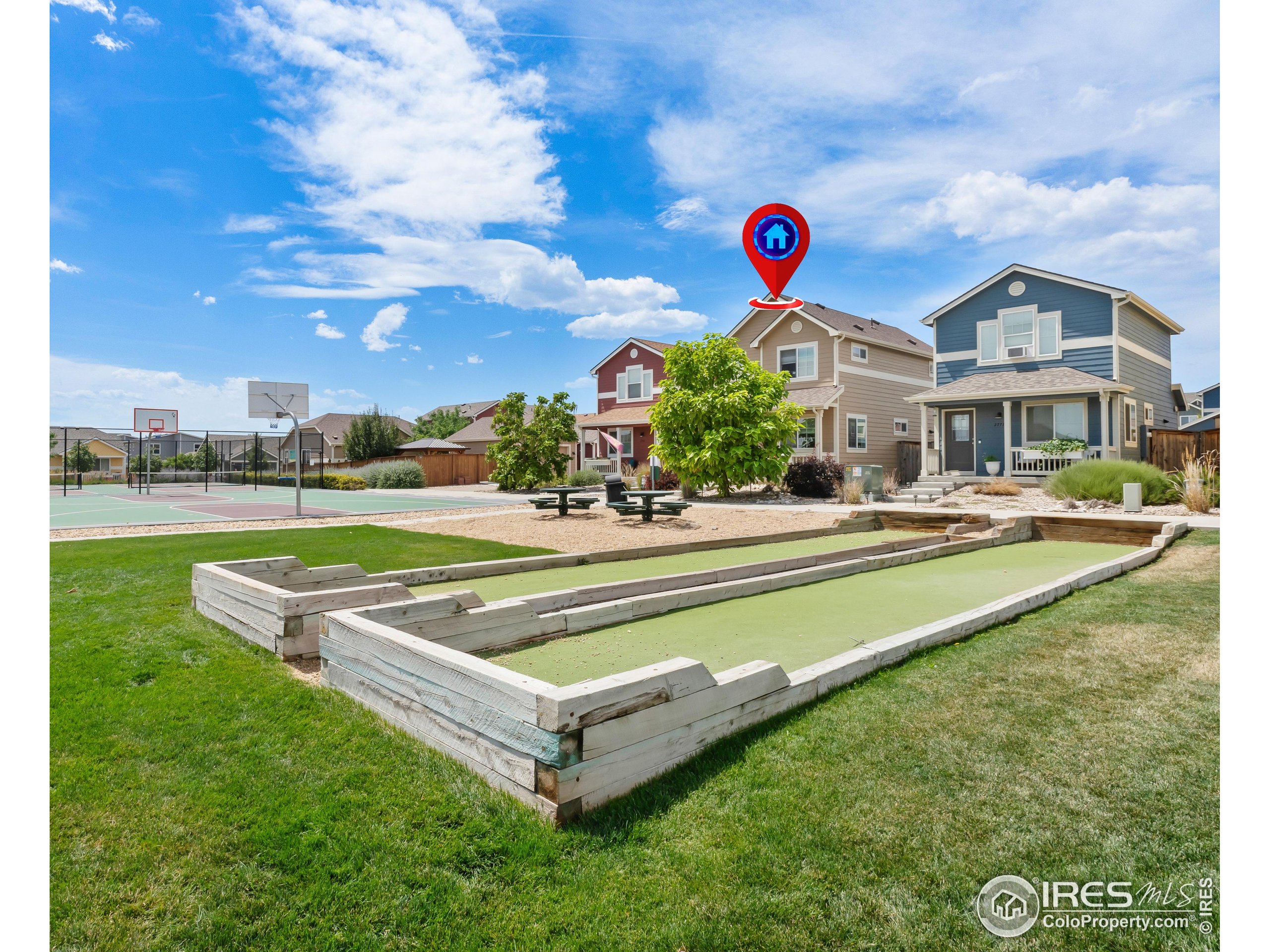 2771 Red Wheat Trail Berthoud, CO 80513 - Photo 5 of 46 a front view of house with yard and swimming pool