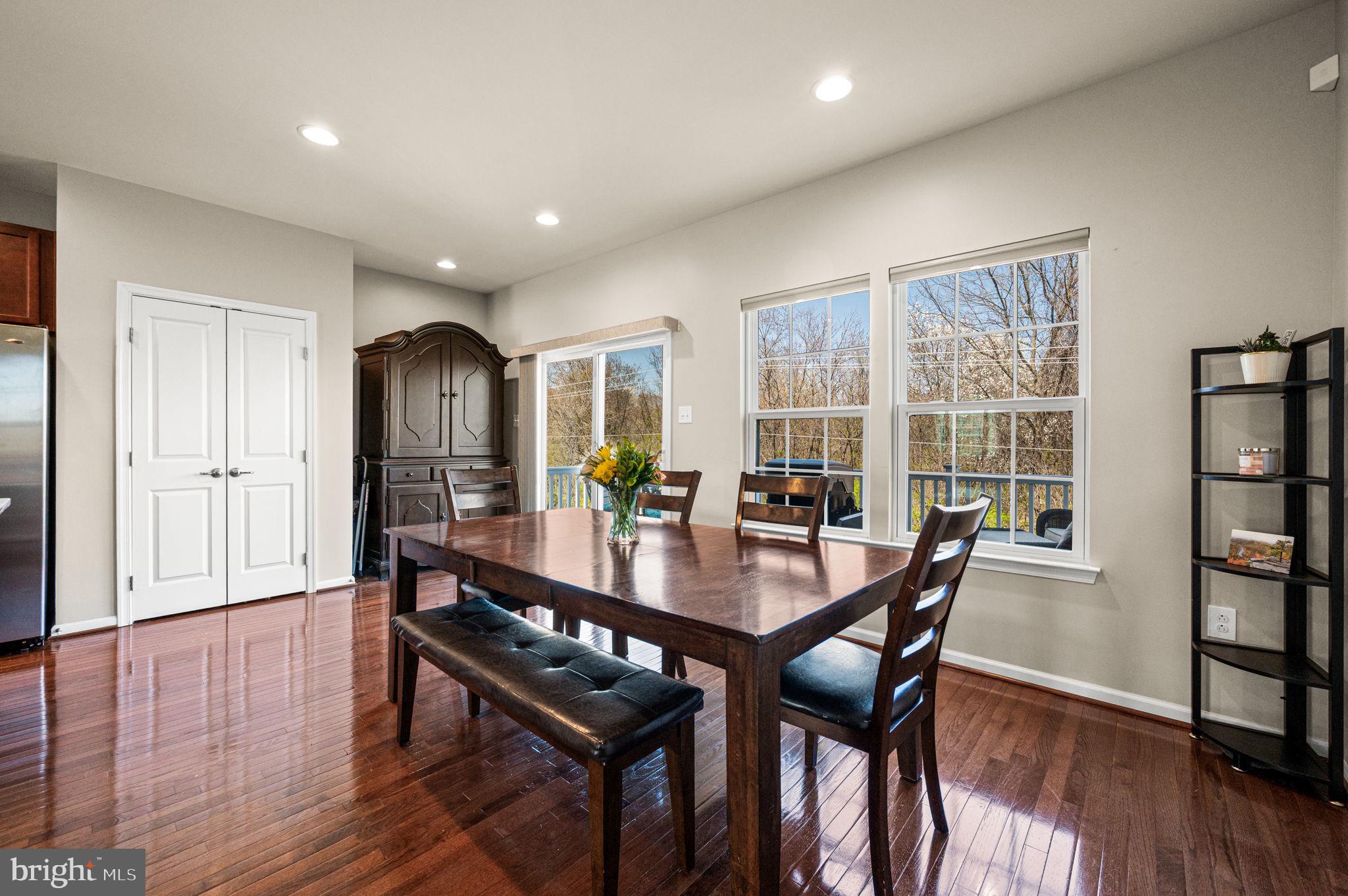 603 Columbus Drive Spring City, PA 19475 - Photo 16 of 35 a view of a dining room with furniture window and wooden floor