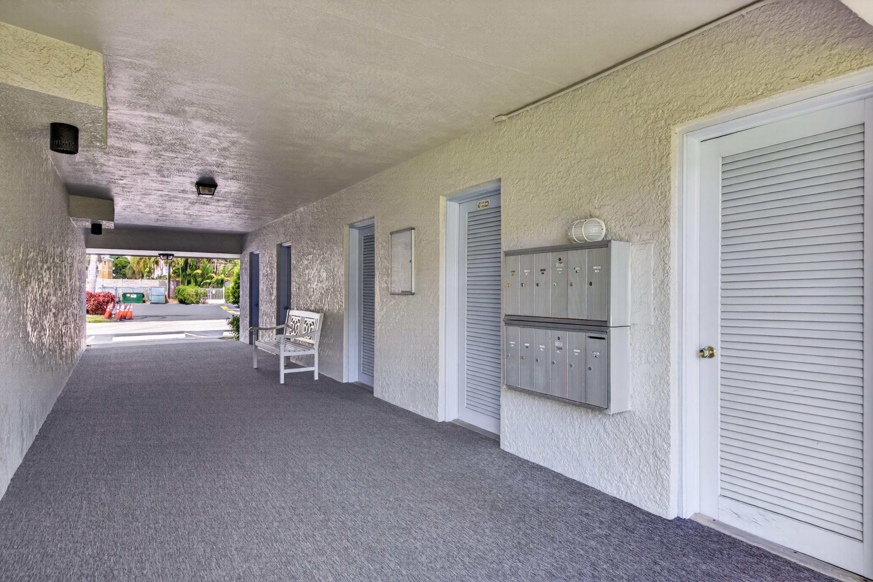 2110 Northeast 42nd Street, Unit 4B Lighthouse Point, FL 33064 - Photo 12 of 17 Hallway-mailbox-35
