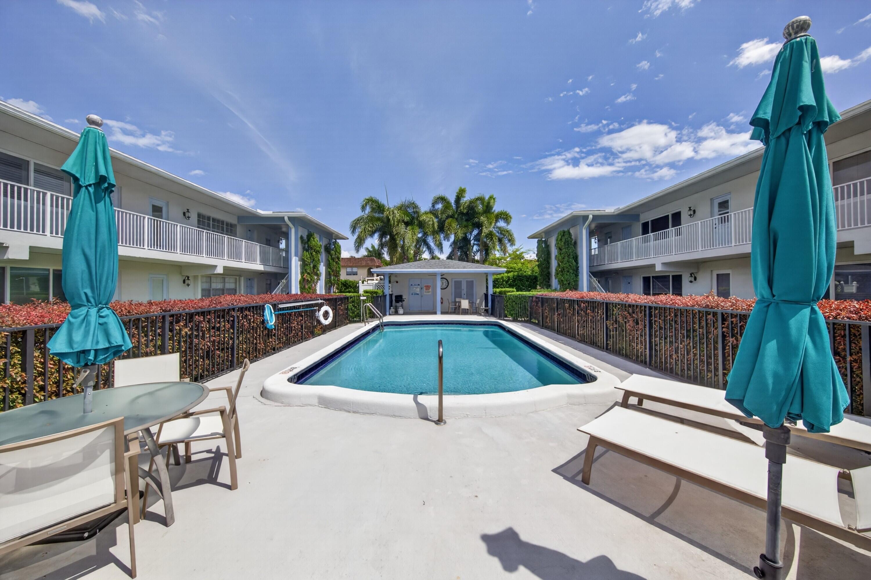 2110 Northeast 42nd Street, Unit 4B Lighthouse Point, FL 33064 - Photo 14 of 17 pool 33