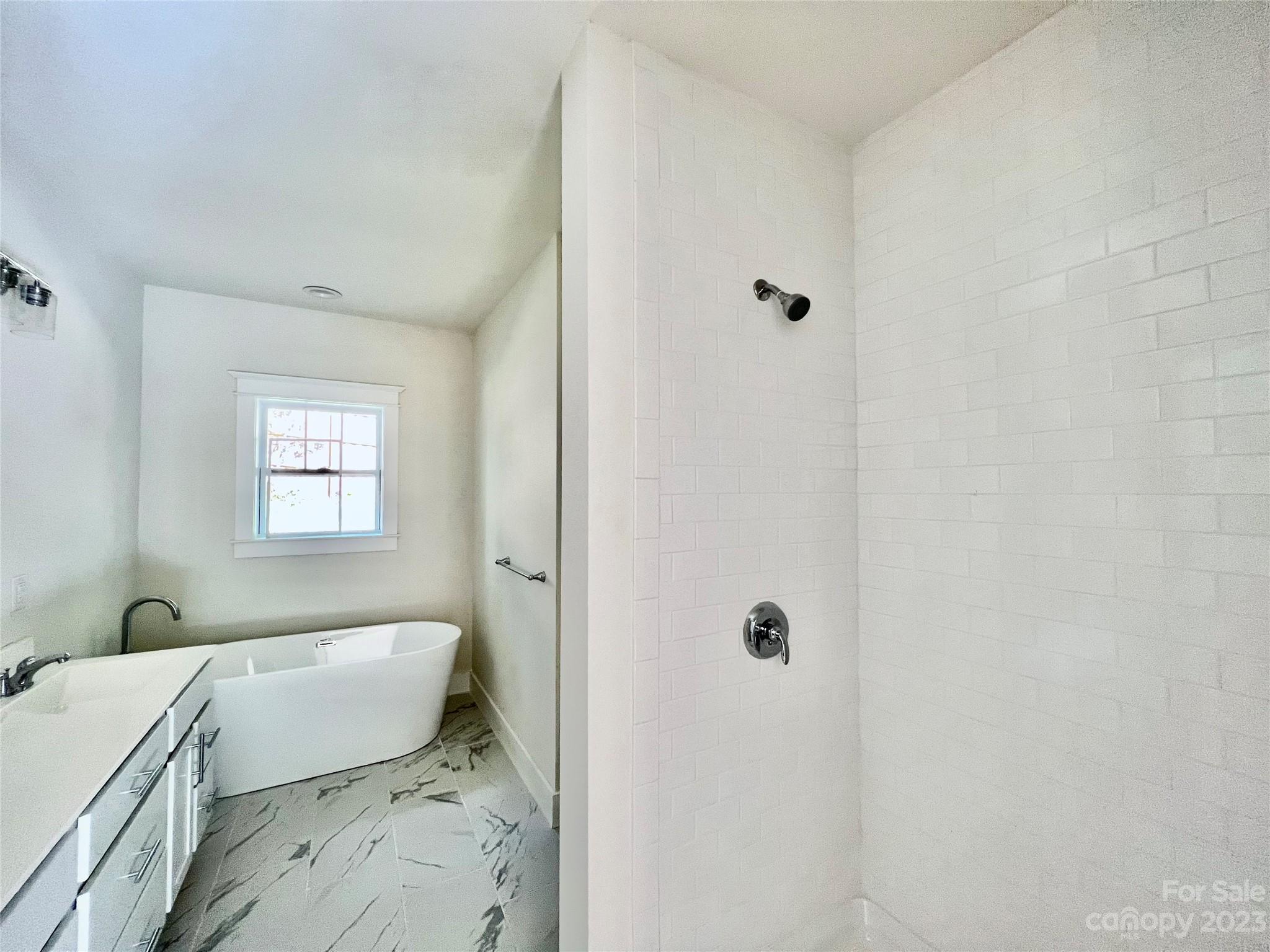 170 Cascade Rdg Road Fairview, NC 28730 - Photo 13 of 23 a bathroom with a bathtub and shower