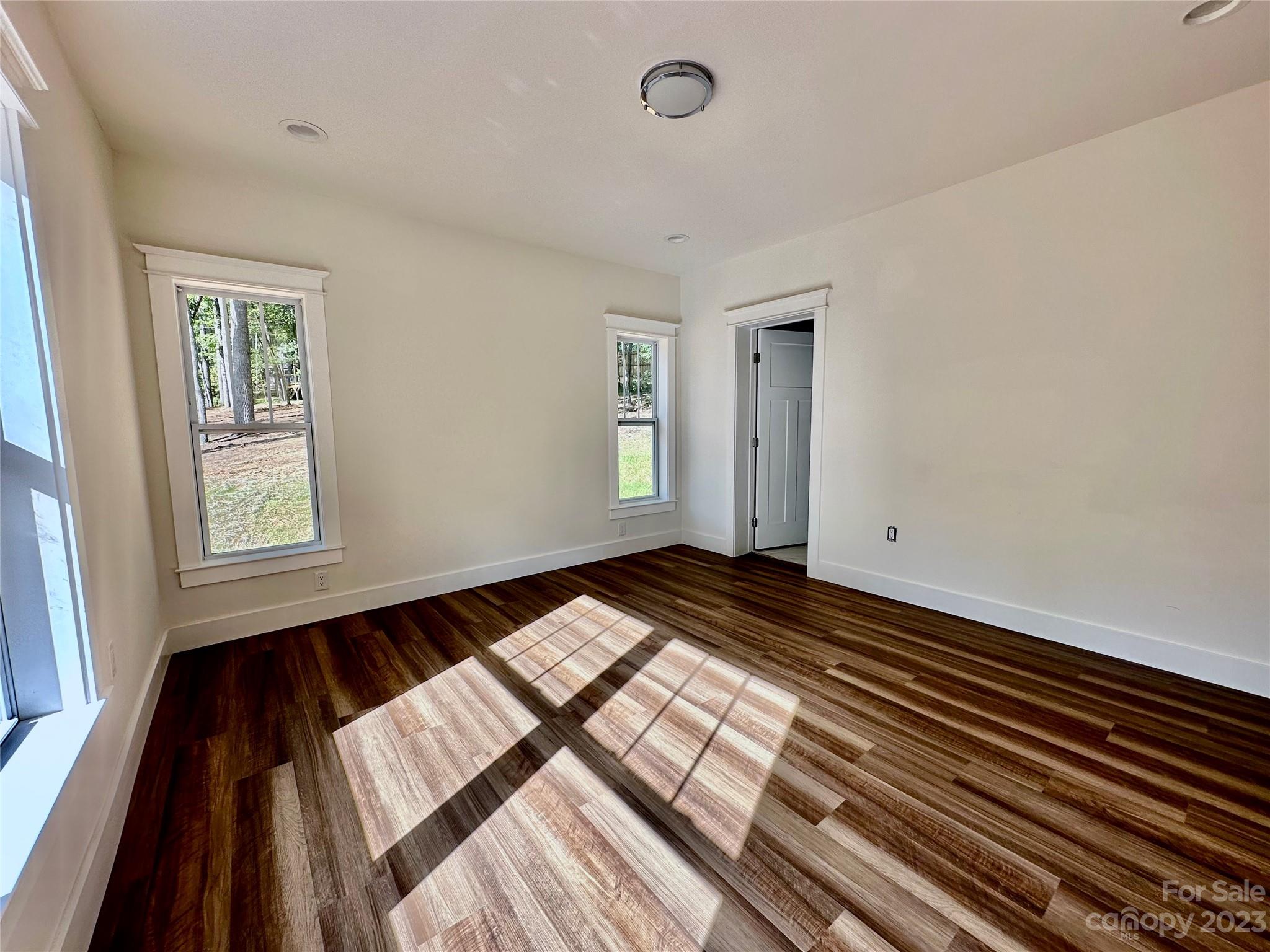 170 Cascade Rdg Road Fairview, NC 28730 - Photo 17 of 23 a view of a room with wooden floor and window
