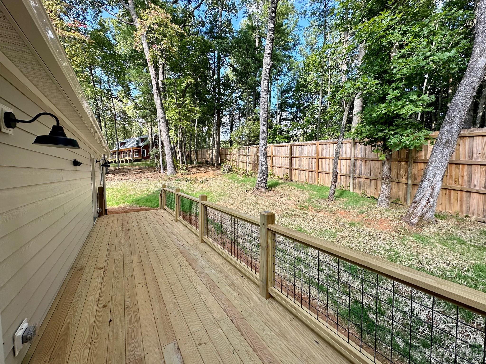 170 Cascade Rdg Road Fairview, NC 28730 - Photo 22 of 23 a view of balcony with wooden floor and fence