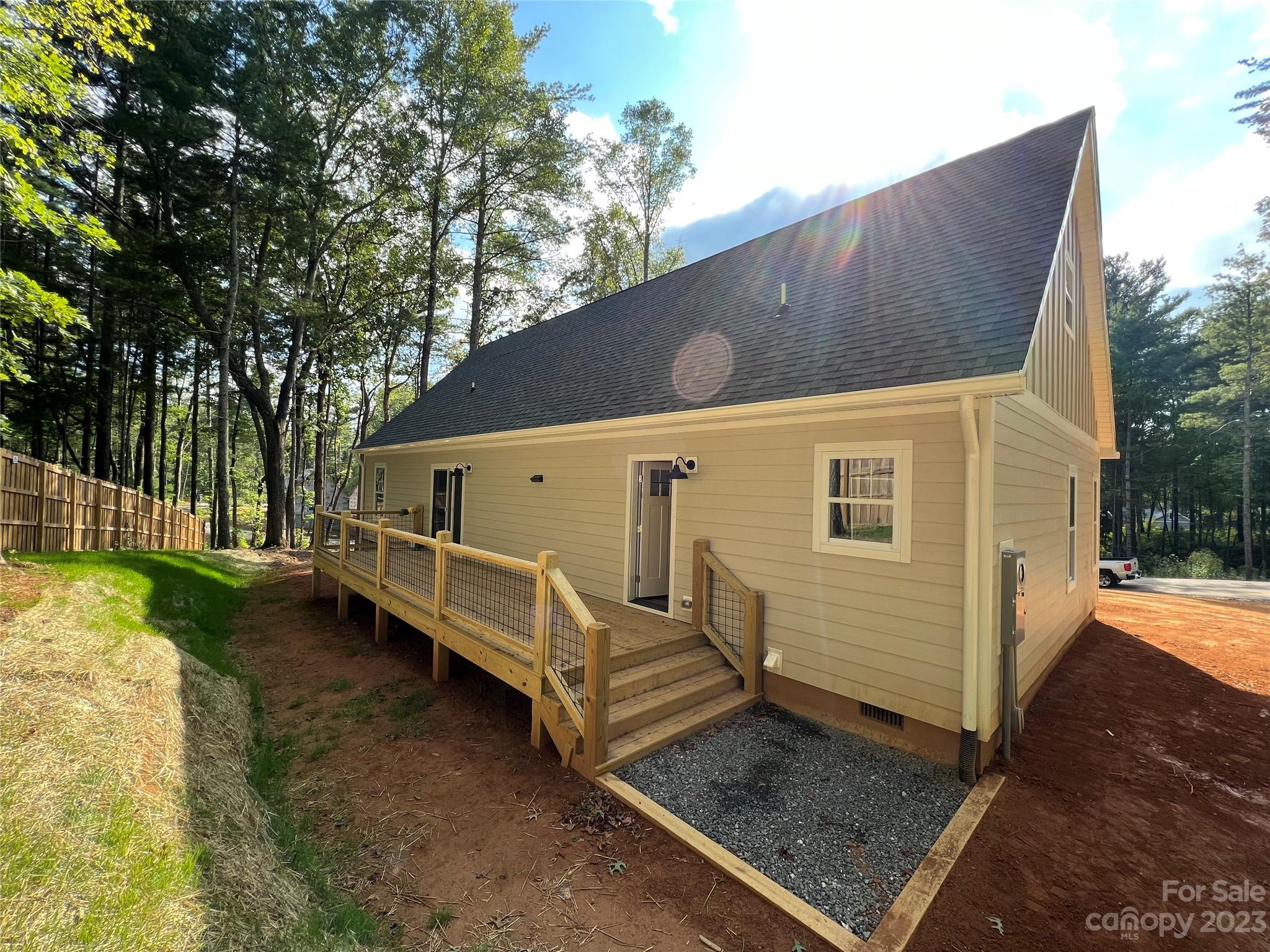 170 Cascade Rdg Road Fairview, NC 28730 - Photo 23 of 23 a view of a house with backyard and sitting area