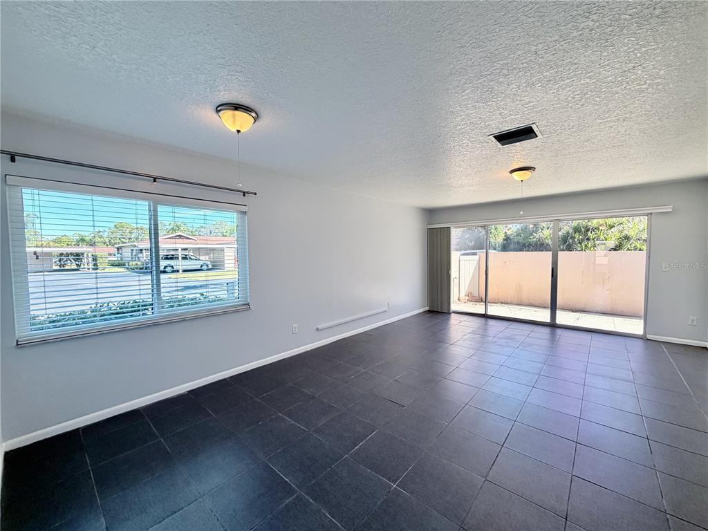 2284 Oak Neck Road, Unit F Clearwater, FL 33763 - Photo 16 of 34 a view of an empty room with a window