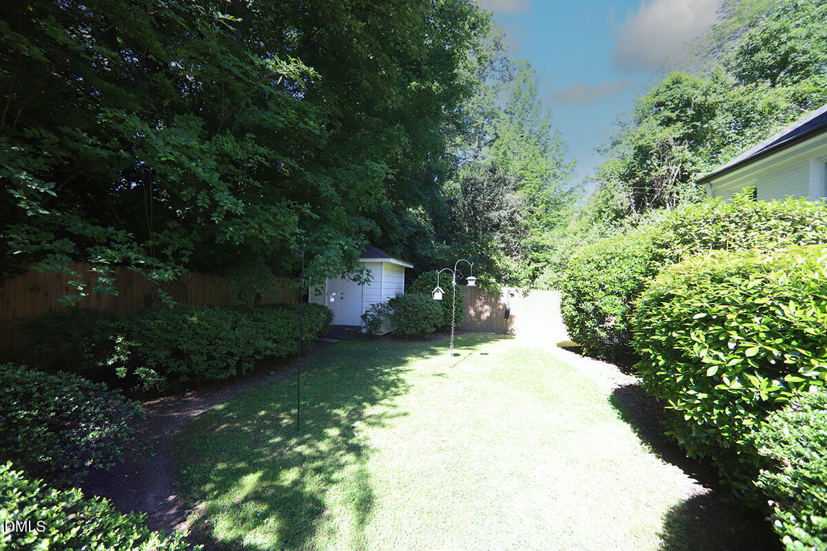 2601 York Road Raleigh, NC 27608 - Photo 21 of 24 a view of a back yard of the house