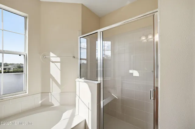 a view of a city with an ocean view