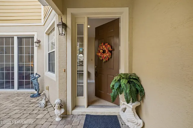 a kitchen with stainless steel appliances granite countertop a stove a refrigerator and a microwave