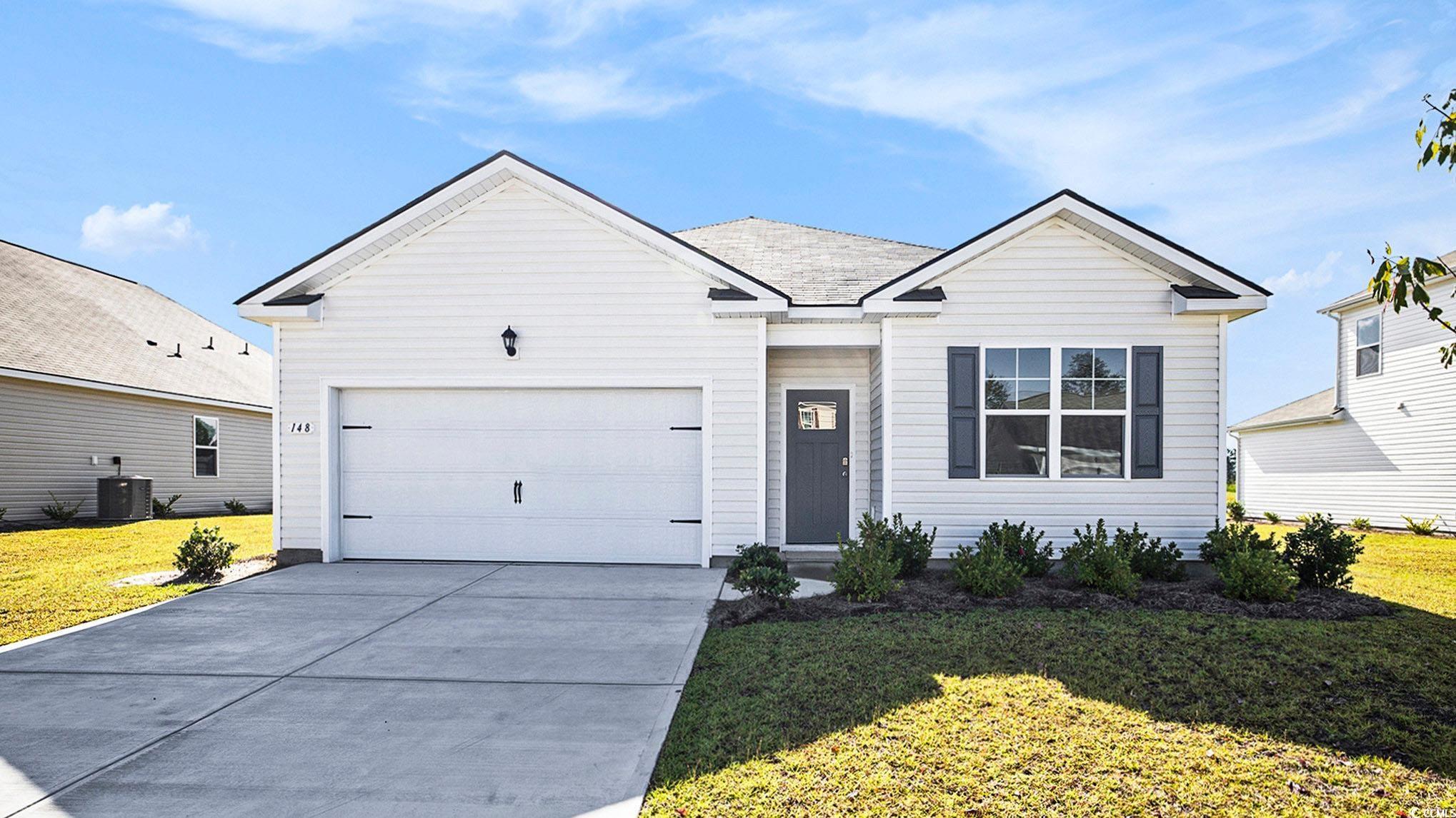 141 Homestead Way Myrtle Beach, SC 29588 - Photo 1 of 28 Single story home with driveway, a front yard, and a garage