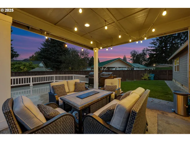 a view of a chairs and tables in the patio