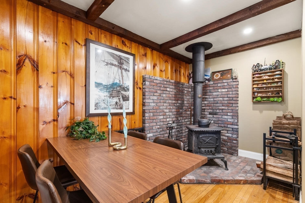 21 Gee Avenue Gloucester, MA 01930 - Photo 11 of 35 a dining room with furniture and wooden floor