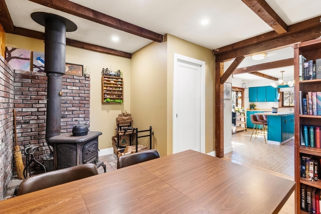 21 Gee Avenue Gloucester, MA 01930 - Photo 12 of 35 a bedroom with furniture and a large window