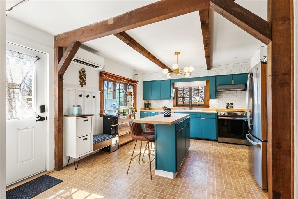 21 Gee Avenue Gloucester, MA 01930 - Photo 14 of 35 a kitchen with a refrigerator and a sink