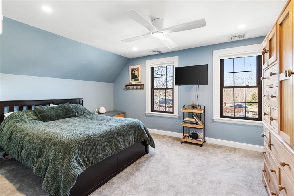 21 Gee Avenue Gloucester, MA 01930 - Photo 23 of 35 a bedroom with a bed and a flat screen tv