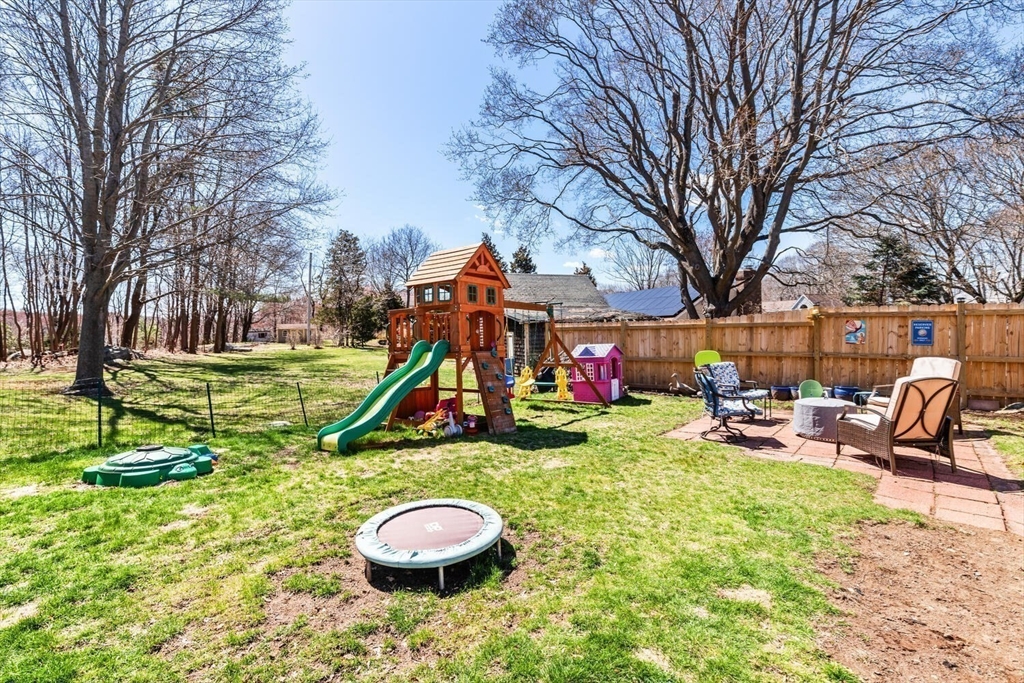 21 Gee Avenue Gloucester, MA 01930 - Photo 33 of 35 a view of a backyard with table and chairs