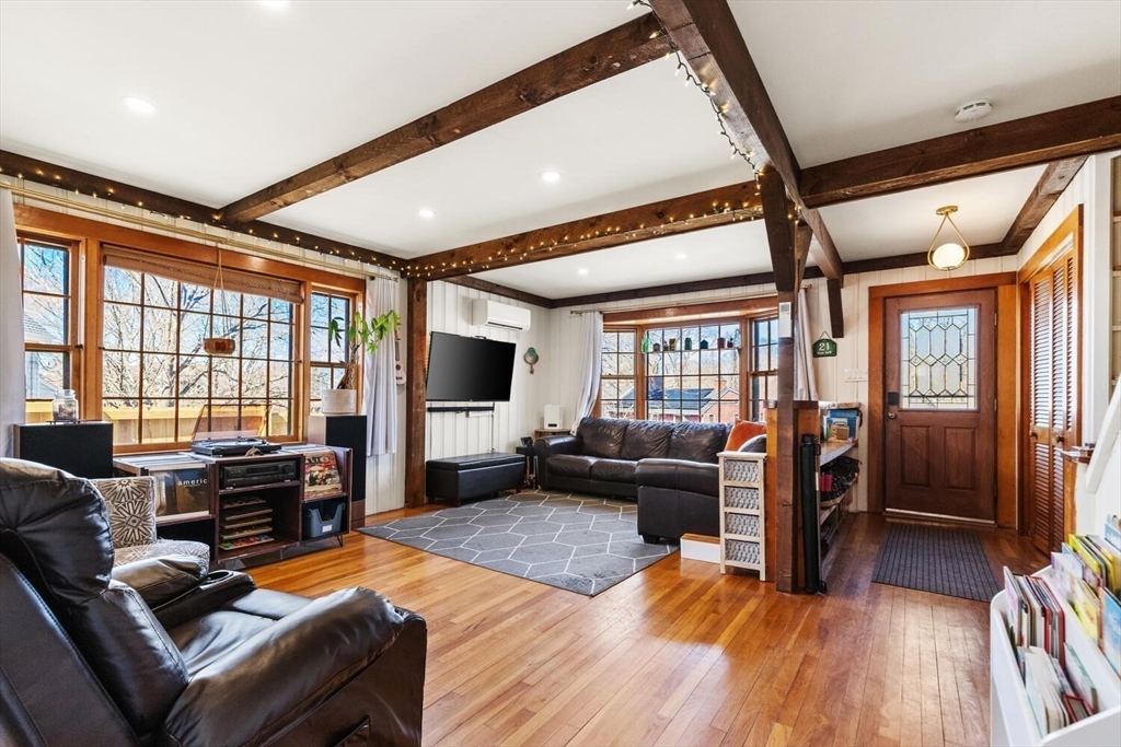 21 Gee Avenue Gloucester, MA 01930 - Photo 5 of 35 a living room with furniture and a flat screen tv