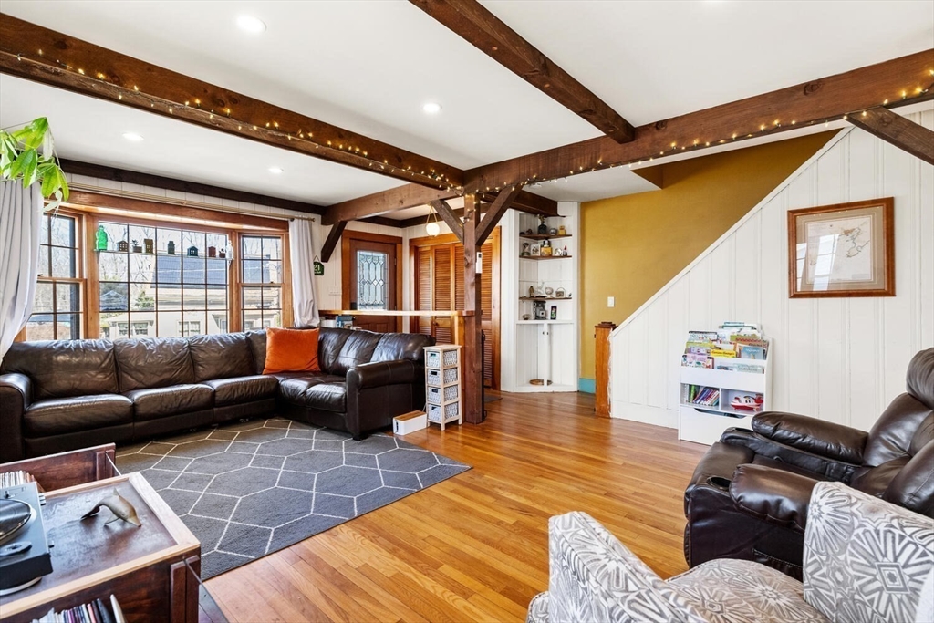 21 Gee Avenue Gloucester, MA 01930 - Photo 6 of 35 a living room with furniture and a window