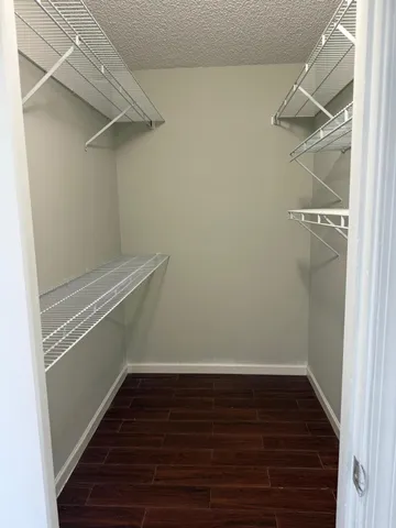 a view of an empty walk in closet