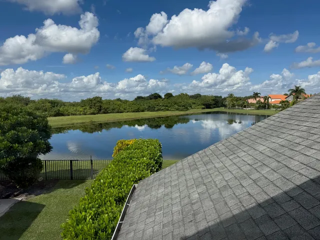 a view of a lake with a city