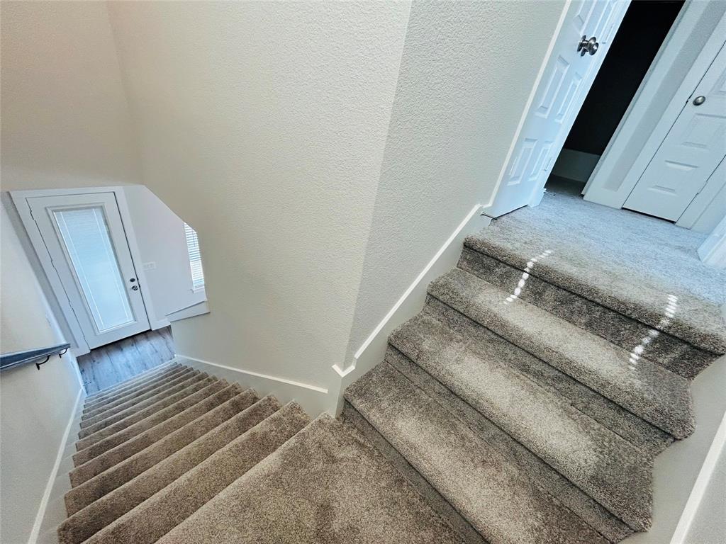 760 West Bedford Euless Road, Unit 214 Hurst, TX 76053 - Photo 26 of 32 a view of a staircase