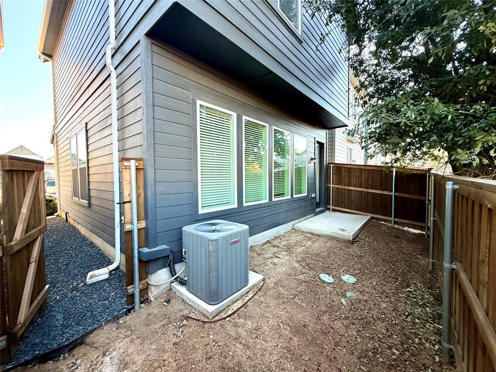 760 West Bedford Euless Road, Unit 214 Hurst, TX 76053 - Photo 10 of 32 a view of a backyard with floor to ceiling window and tree