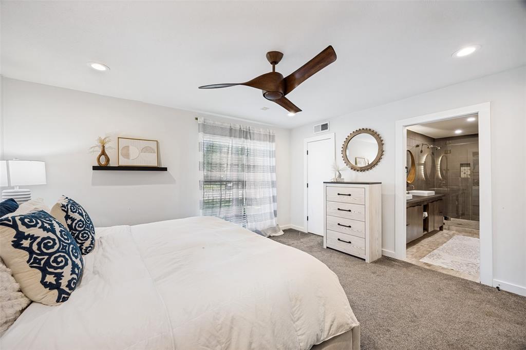 3151 Merrell Road Dallas, TX 75229 - Photo 14 of 25 Carpeted bedroom featuring a contemporary wood-finish ceiling fan, recessed lighting, and a window with blinds