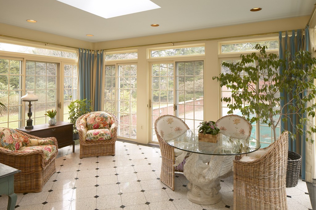 24 Carisbrooke Road Wellesley, MA 02481 - Photo 6 of 13 a living room with furniture and floor to ceiling windows