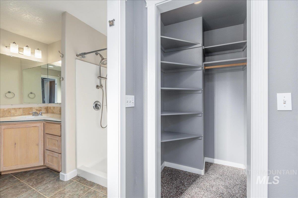 237 16th Avenue North Payette, ID 83661 - Photo 27 of 36 Bathroom with vanity and a shower stall