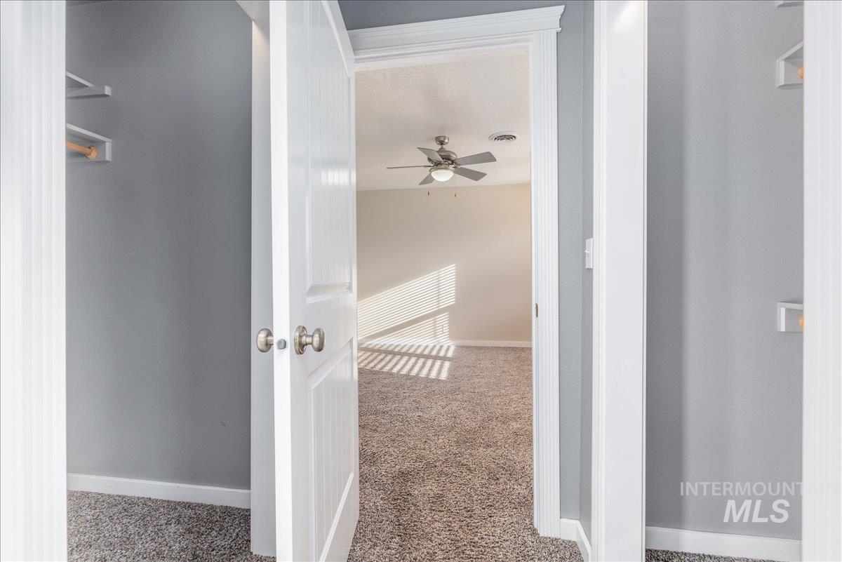 237 16th Avenue North Payette, ID 83661 - Photo 28 of 36 Hallway featuring carpet and baseboards