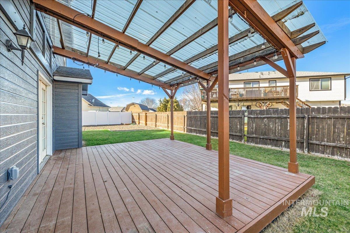 237 16th Avenue North Payette, ID 83661 - Photo 32 of 36 Deck with a fenced backyard