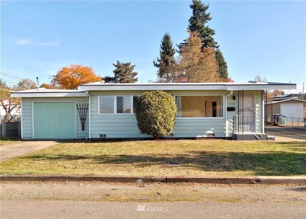 2189 Northeast 9th Place Renton, WA 98056 - Photo 1 of 21 a view of a house with backyard
