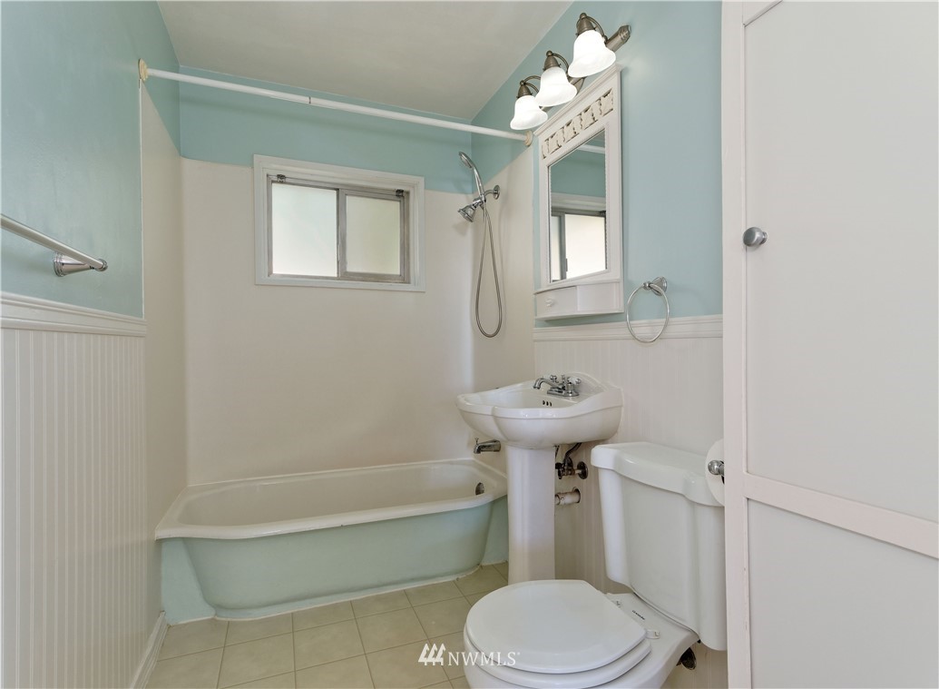 2189 Northeast 9th Place Renton, WA 98056 - Photo 14 of 21 a bathroom with a sink toilet and shower